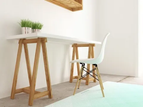 Escritorios pequeños: ideas fáciles y simples para decorarlos Armar el escritorio con un tablon y caballetes es una opción más barata y muy canchera.