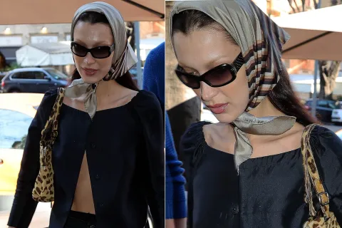 "Dolce Nonna": el estilo que conquista el street style y enamora a la generación Z Bella Hadid caminando con un pañuelo en la cabeza